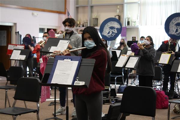 student playing instrument